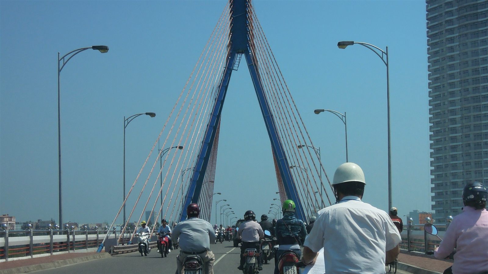 Motorbike traffic crossing the Han River bridge in Da Nang